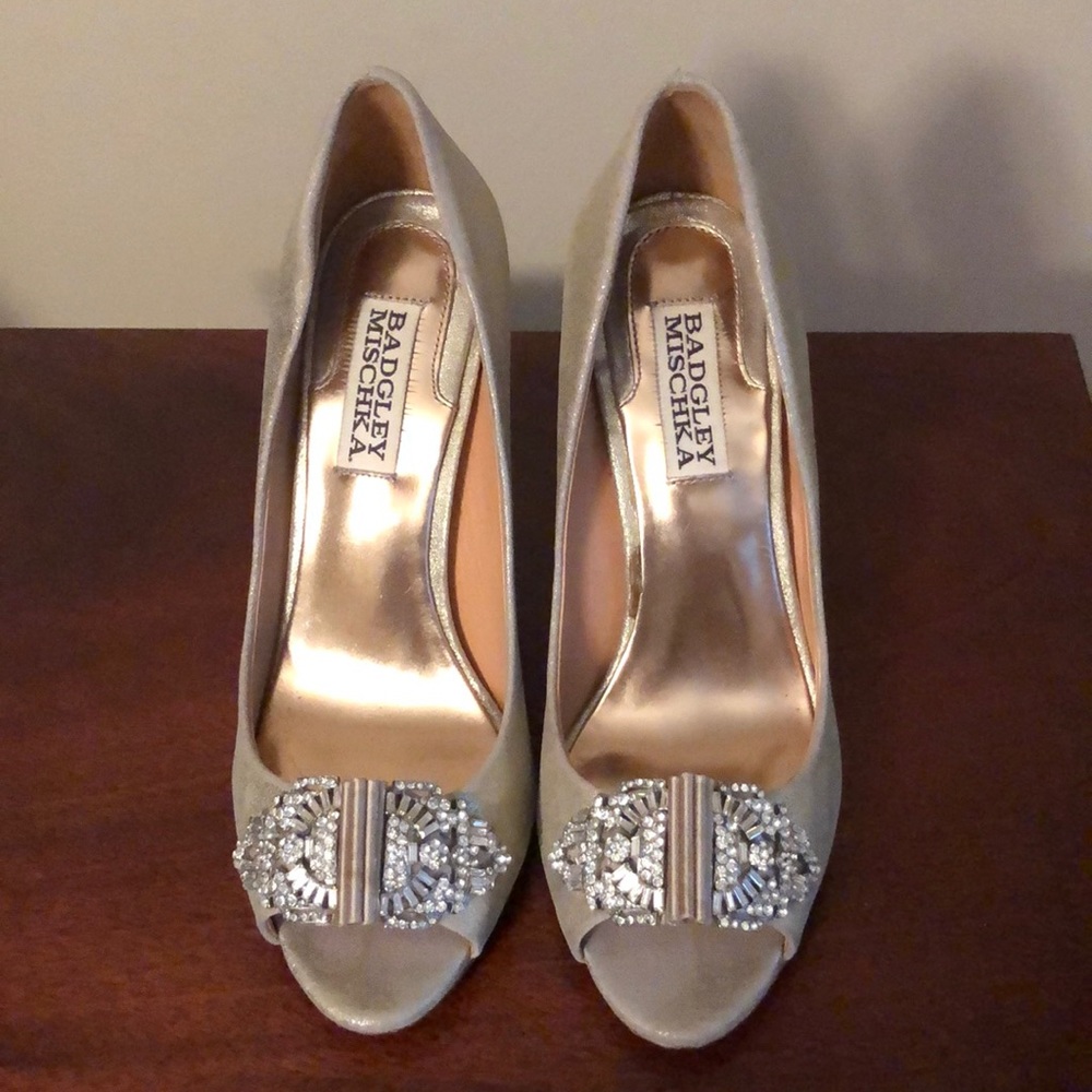 Badgley Bischka gold pumps with Brooch
